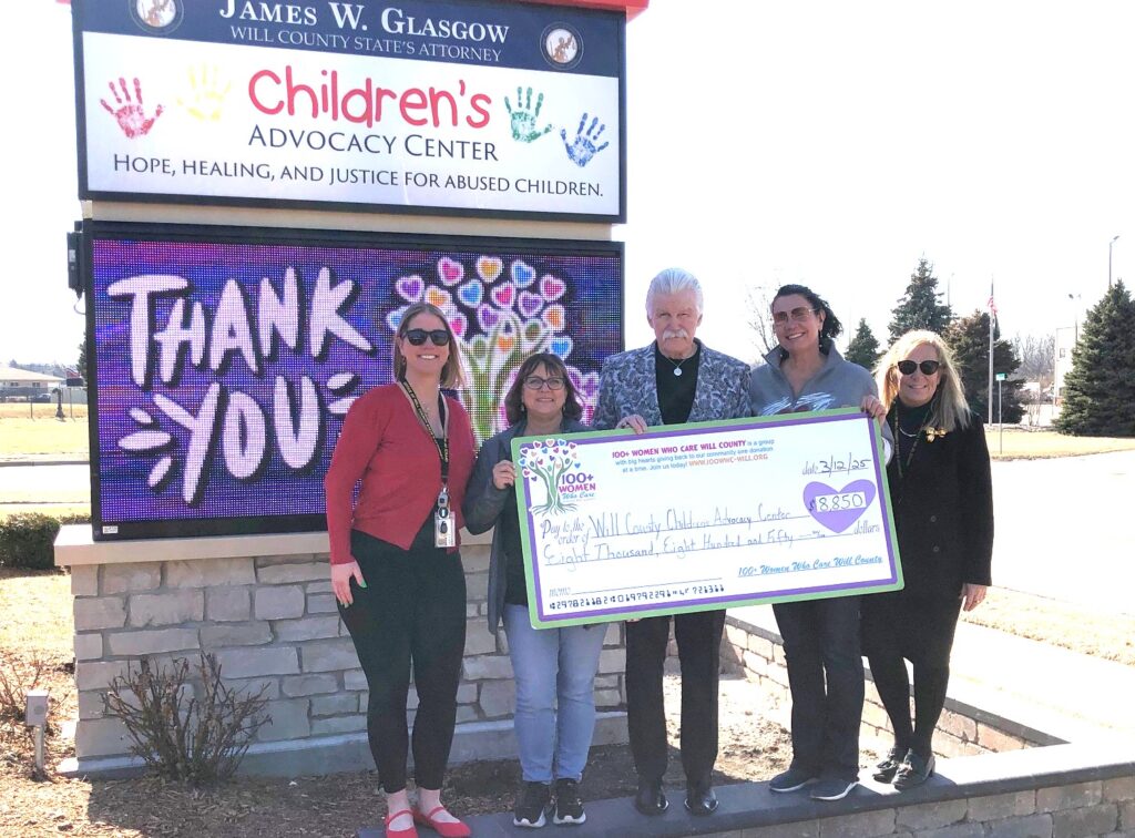 100+ Pictured at the donation are, from left, Jaclyn Lundquist, Assistant Director Will County CAC; Denise Salvino - 100+ WWC member;, James Glasgow, Will County State’s Attorney; Trisha Kiwior - 100+ WWC member; and Lisa Morel Las, Executive Director Will County CAC