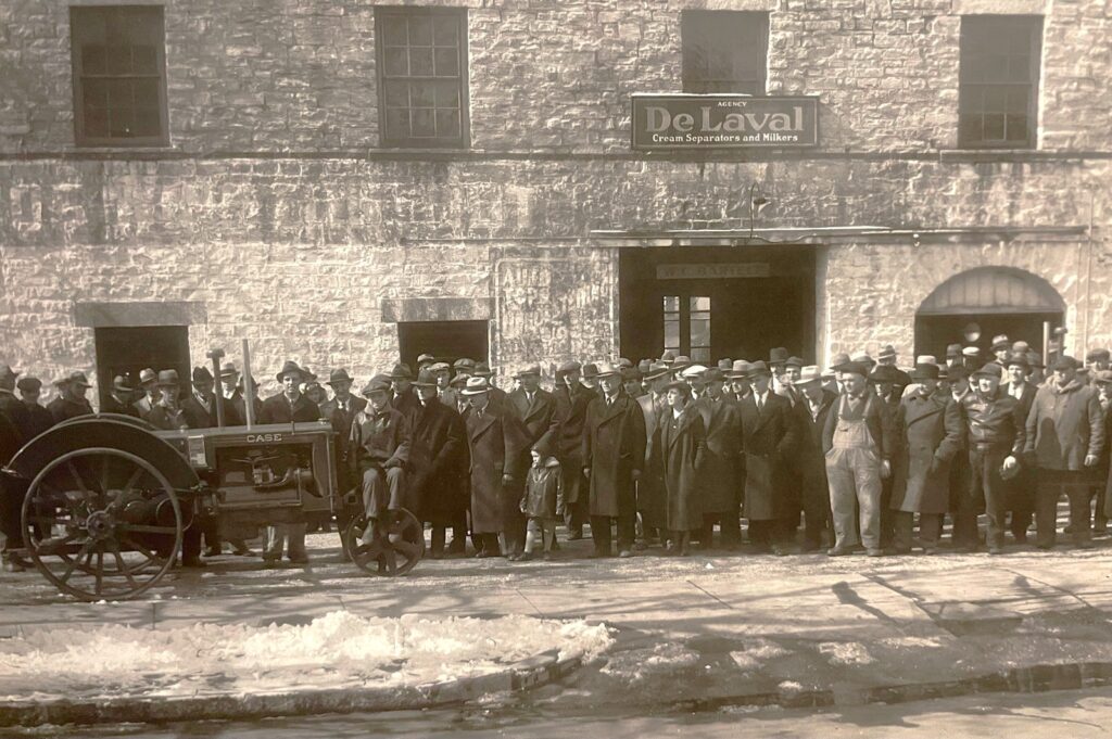 Don Bartelt submitted this photo of 100 local farmers assembled on a cold winter day for this 1935 photo taken at 155 N. Joliet St. in Downtown Joliet. The new 1935 Case tractor was being introduced by WC Bartelt at his farm implement store, which remained in operation by his son Don until the late 1950s. Harrah's Casino now occupies the site.