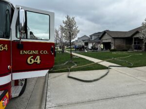 New Lenox Fire Protection District Extinguishes Garage Fire on Somerset Court; Lithium-Ion Battery Noted as Potential Cause