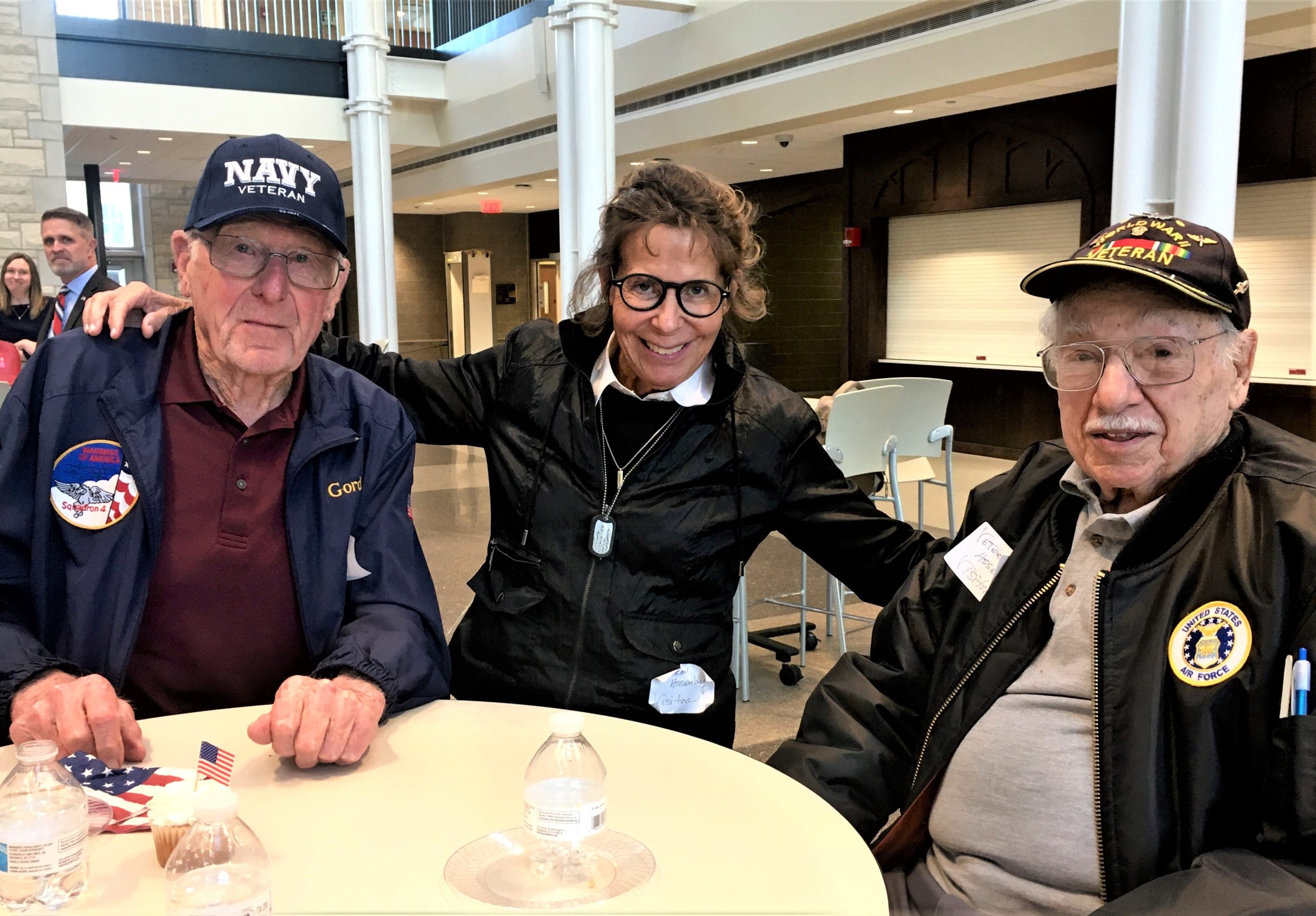 Gordon Miller, Navy Vietnam War Era Veteran, Veronica Konow, Navy Gulf War Veteran, and Ted Micci (101 years young) Air Force 305th B.G. WWII Veteran share stories of military service while attending the Veterans Ceremony at Joliet Central High School. This program included a Veterans Day Video Tribute, music by JCHS students, posting and presentation of flags by JROTC Cadets and personal recognition of Veterans ranging from WWII to those who are currently serving. (Photo provided)