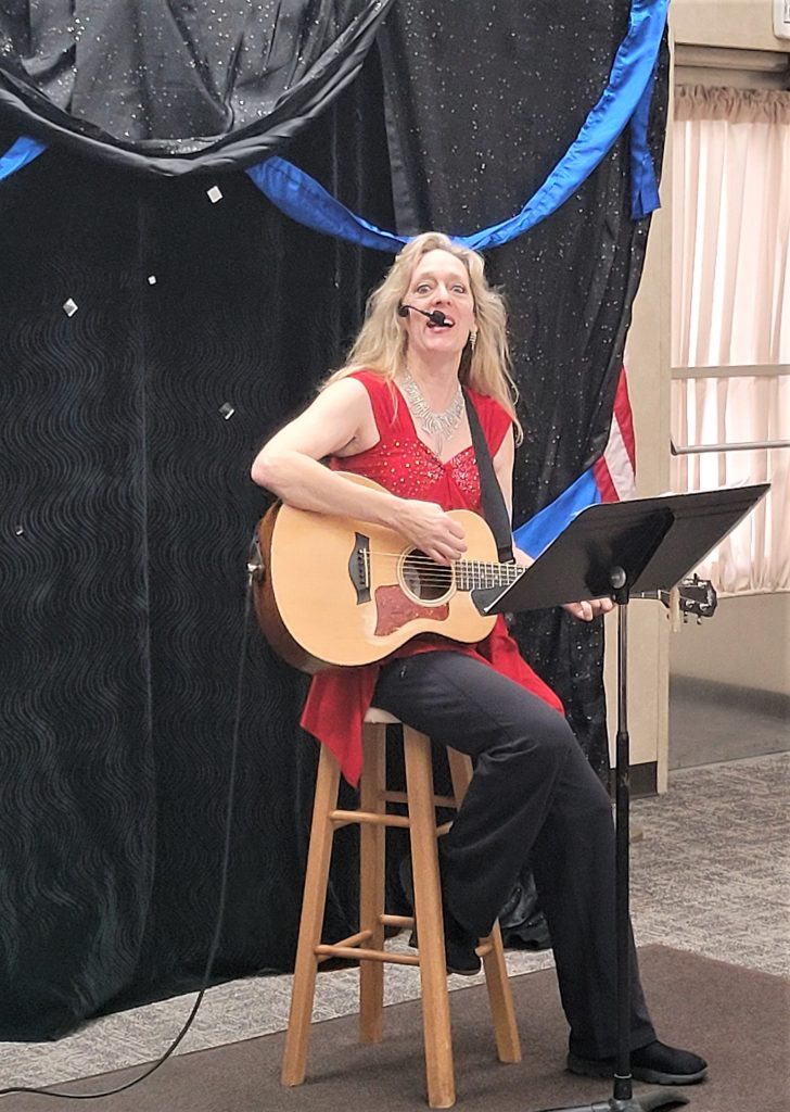 Musical entertainer, Karen Marie, sang and had the PrimeTimers group participate in many of the Christmas songs that we all enjoy during Christmas at their annual holiday party on December 7 at the Will County Farm Bureau.