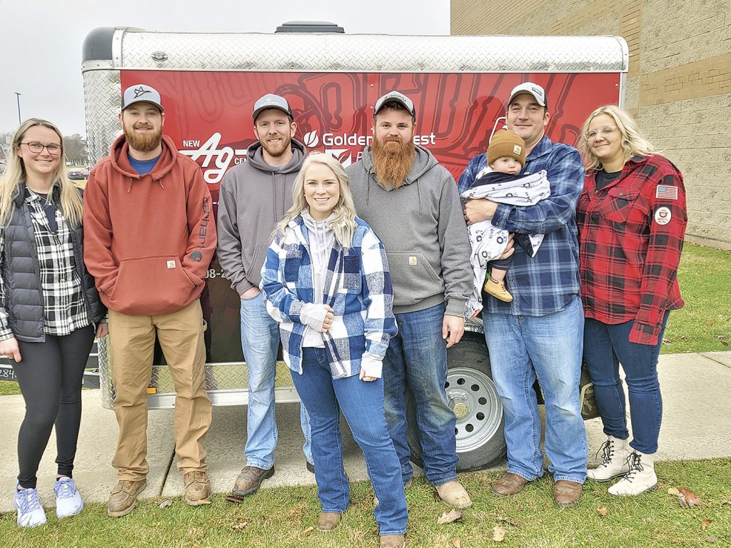 The Young Farmers Committee sponsored their last pedal pull of the year at the Christmas at the Village in Peotone on December 10th. Helpers were l to r: Lindsay Matthias, Kyle Johnson, Jarrad Mulderink, Courtney Sowa, Austin Brown, Corey and Clyde brandau and Amy Brandau.