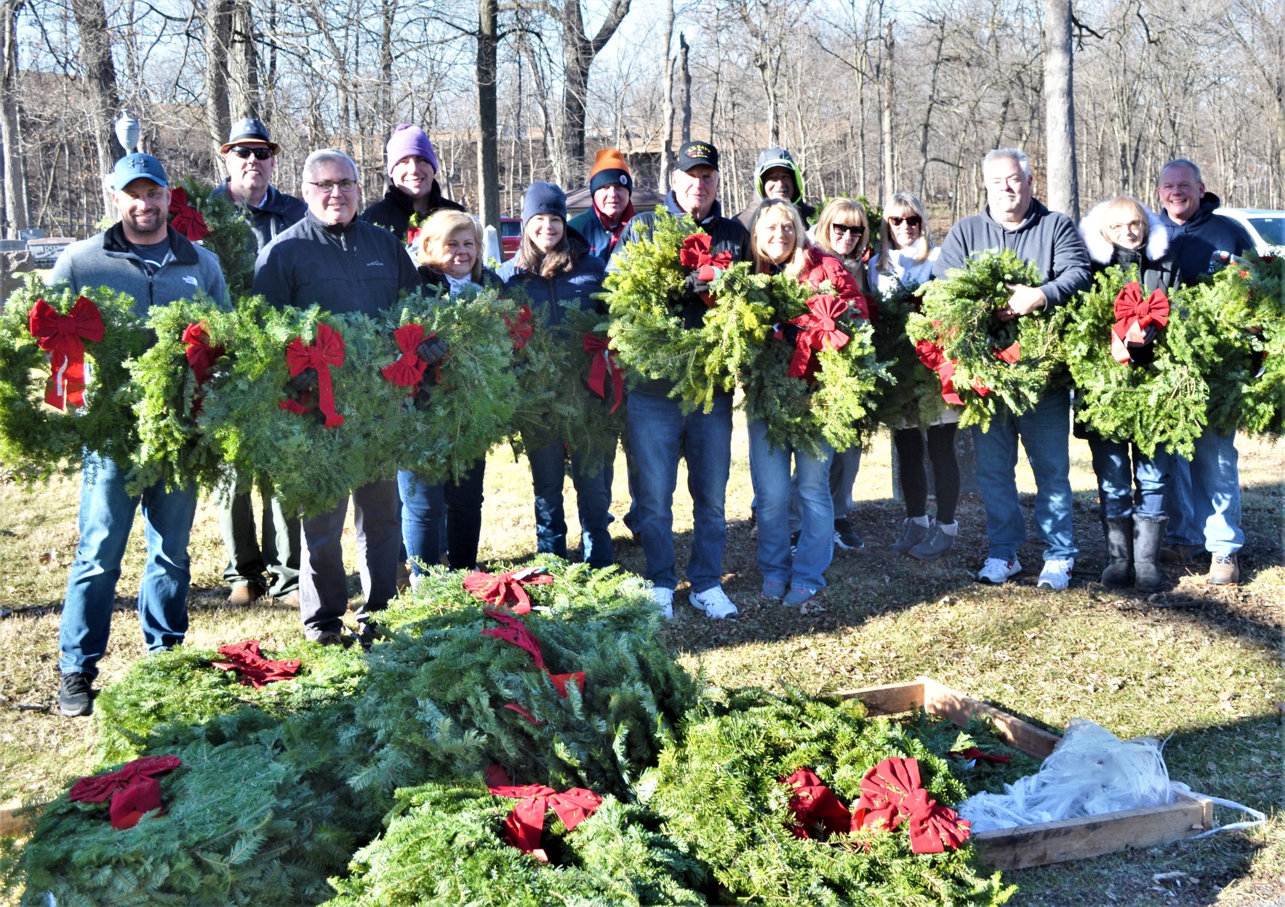 The wreath-laying at Maplewood Cemetery in New Lenox took many happy hands. (Photos by Karen Haave)