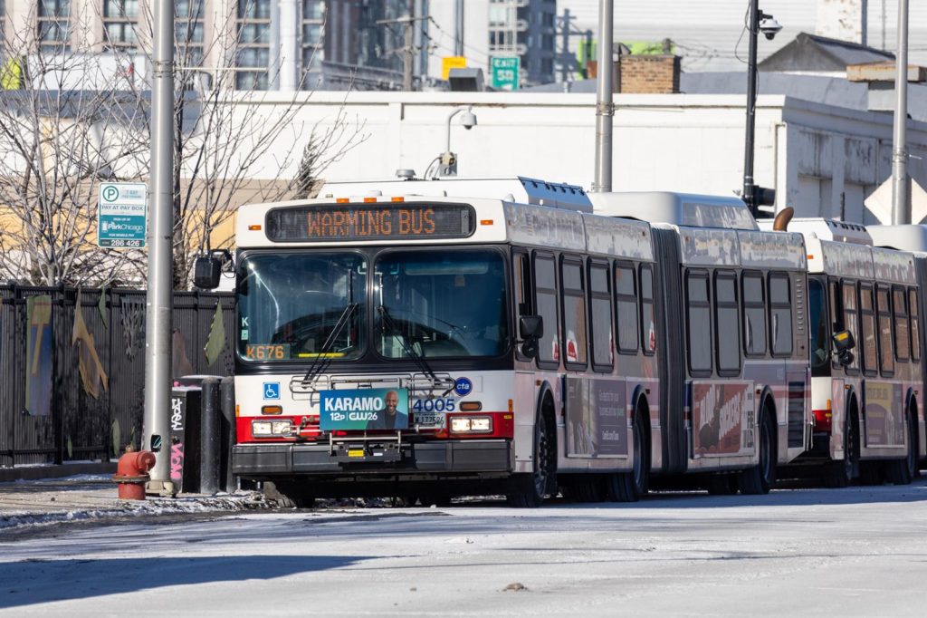 Chicago Transit Authority “warming buses” are pictured idling outside the city’s “landing zone” facility where migrants are dropped off after being bused from Texas. (Capitol News Illinois photo by Andrew Adams)Thursday, January 18, 2024