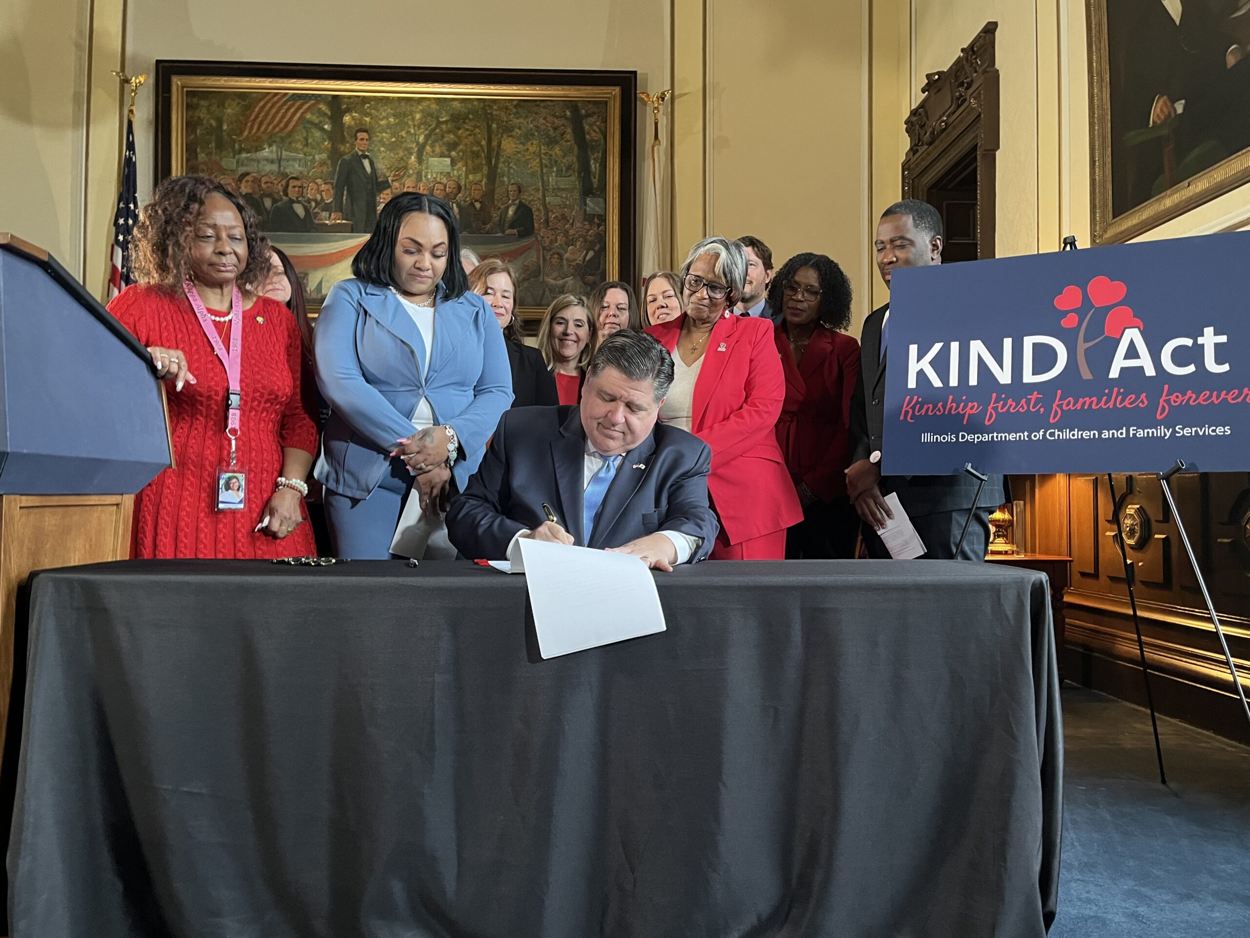 Pritzker signs law to prioritize placing foster children with family members