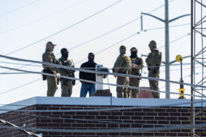Immigration officials seek to justify use of force on Chicago-area protesters