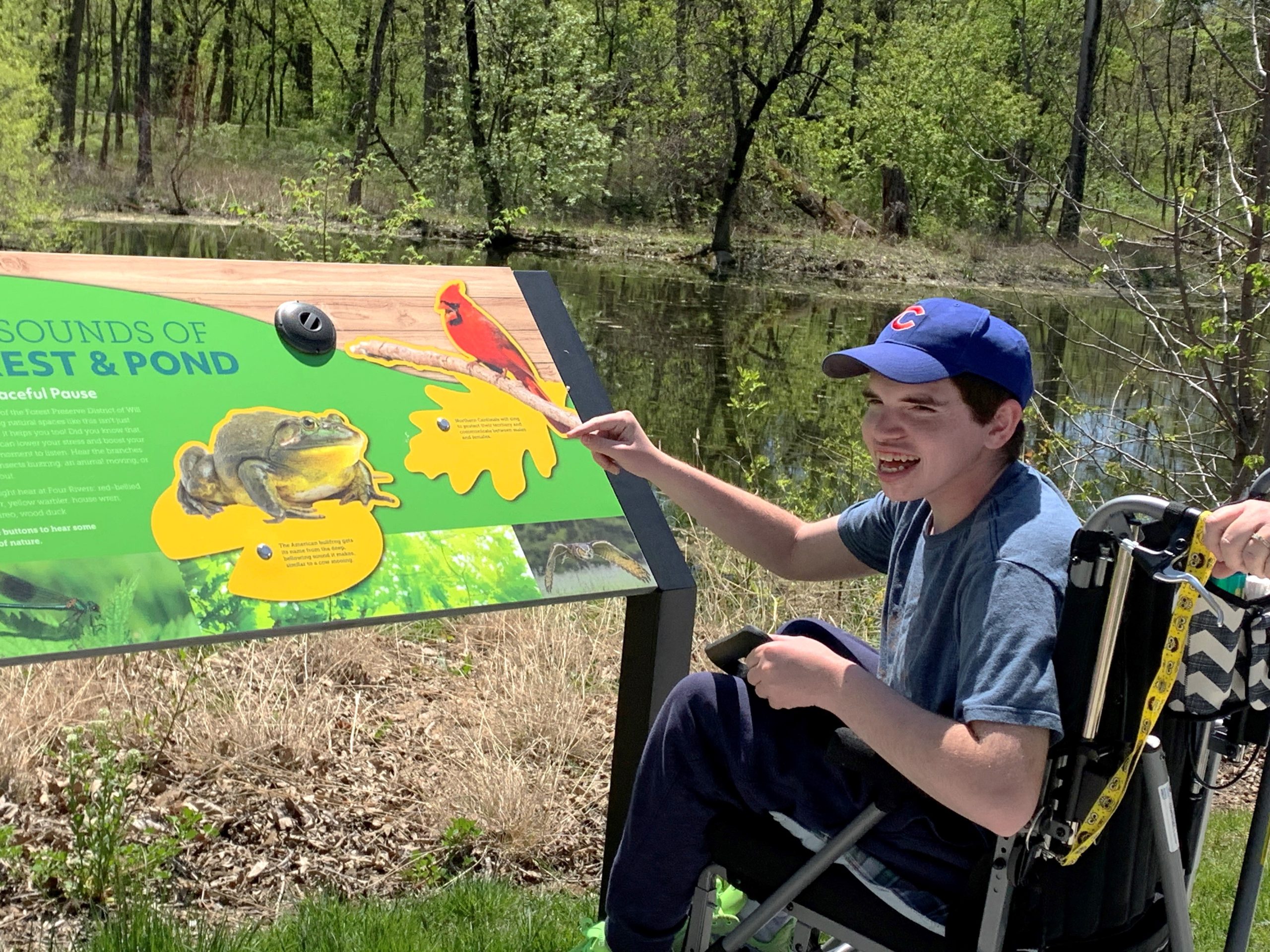 Visitors explore the All-Persons Trail at Four Rivers Environmental Education Center in Channahon. Four Rivers recently received the National Inclusion Project’s first accreditation for a nation center in the country. (Photo by Forest Preserve staff | Cindy Cain)