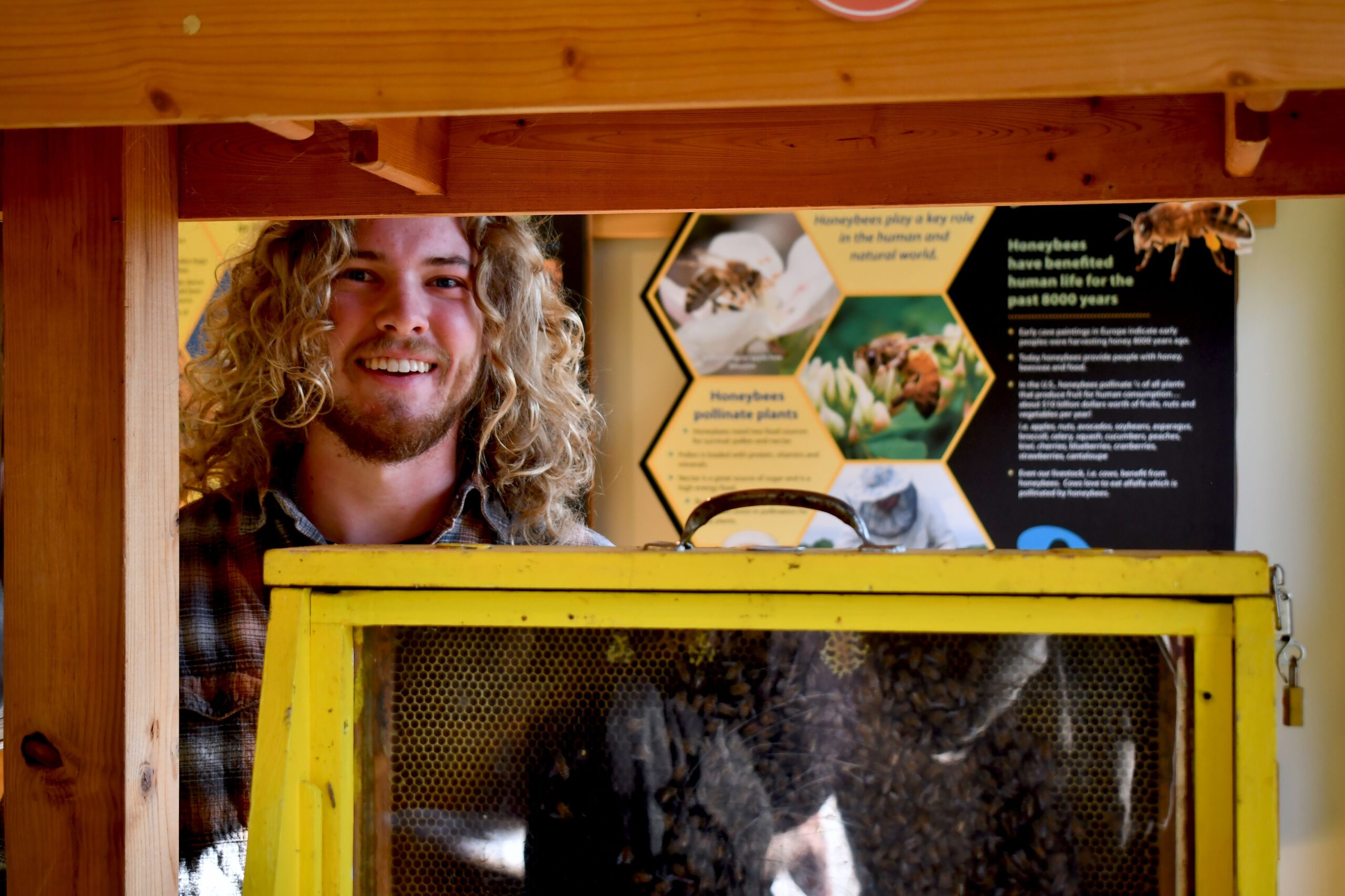 New beekeeper Dade Bradley brings curiosity, conservation and community spirit to Plum Creek Nature Center. Get to know him and more about bees at the monthly Meet a Beekeeper programs at Plum Creek. The next program is June 7. (Forest Preserve photo).
