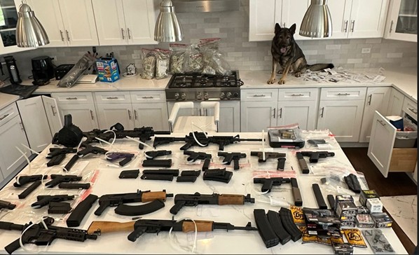 Firearms, Drugs, and Other Items Seized at Defendant Howard's Residence Firearms, Drugs, and Other Items Seized at Defendant Howard's Residence
