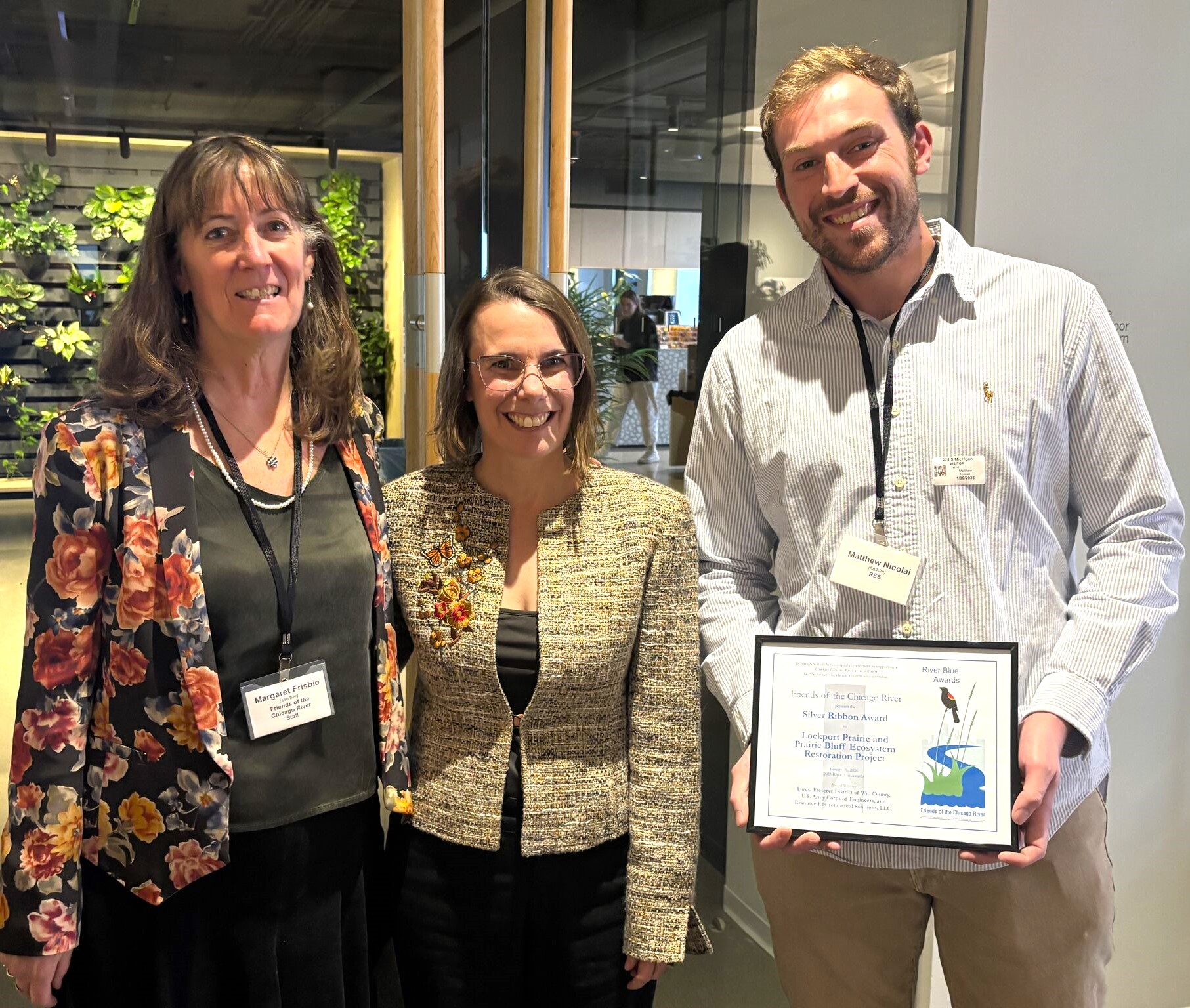 A Forest Preserve District of Will County project receives a Silver Ribbon Award on Jan. 30 from Friends of the Chicago River. From left to right are Margaret Frisbee, executive director of Friends of the Chicago River; Juli Mason, director of conservation for the Forest Preserve; and Matthew Nicolai, ecological restoration supervisor at Resource Environmental Solutions LLC. (Photo courtesy of Friends of the Chicago River)