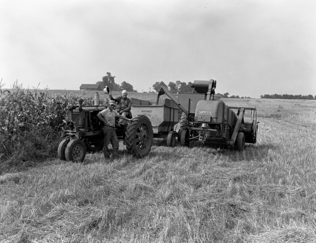 Remember that picture of the shed in the October 30 edition of Farmers Weekly Review, the one that burned down with machinery in it? Here's a photo from the Crete Historical Society of Gustav Haemker waving his hat to us on his 1939 F-20 Tractor and his nephew, Paul Haemker in 1967. That tractor was in the shed.