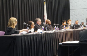 Illinois Supreme Court travels to Macomb to hear cases on pretrial release, student transportation