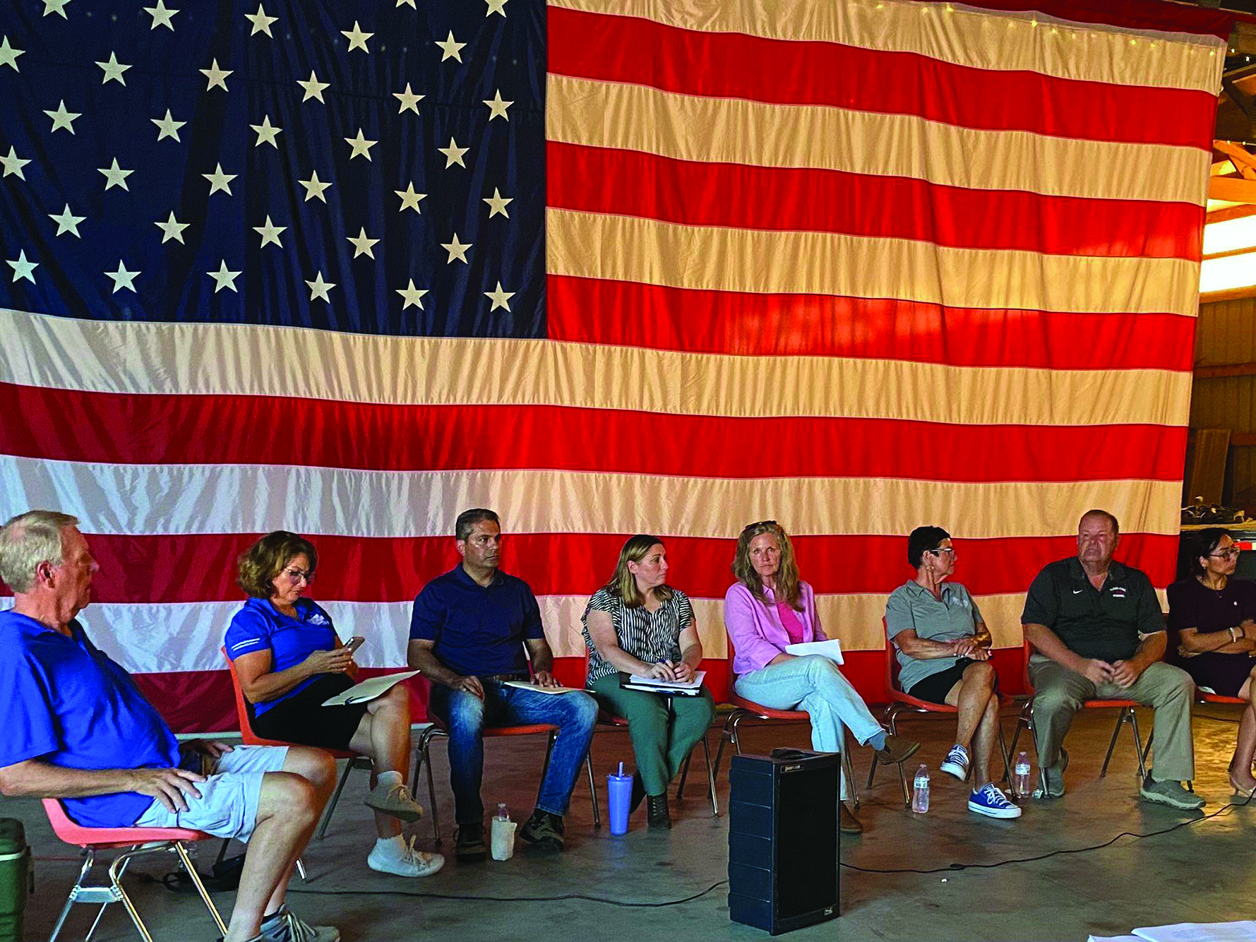Pictured are (From Left) WCFB Governmental Affairs Chair Rick Johnson asks questions of state legislators Sen. Meg Cappel, Rep. Anthony DeLuca, Sen. Rachel Venture, Sen. Laura Ellman, Rep. Natalie Manley, Sen. Patrick Joyce and Rep. Dagmara Avelar.