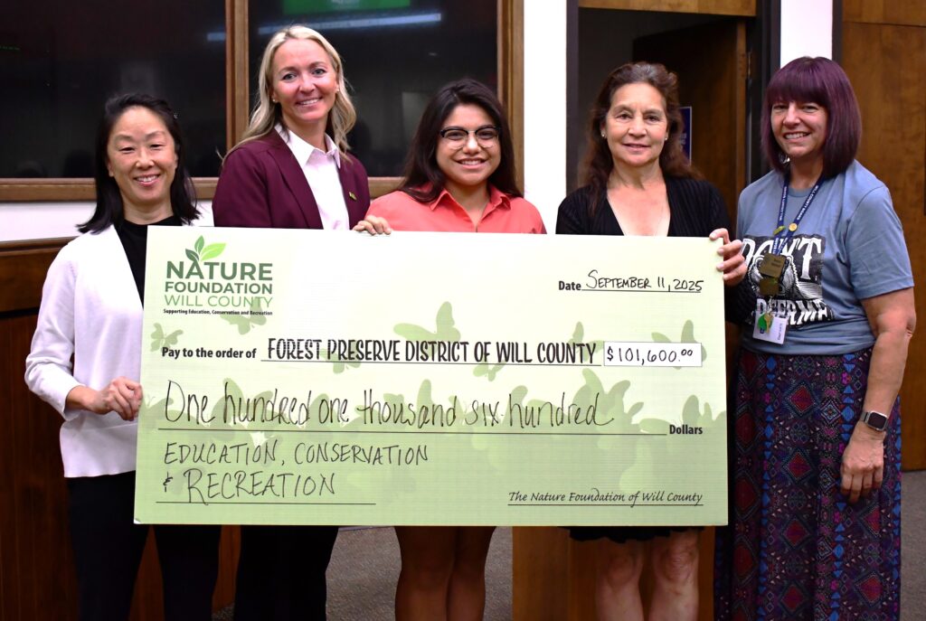 From left to right are Foundation Executive Director Tara Neff, Forest Preserve Executive Director Tracy Chapman, Forest Preserve Board President Destinee Ortiz, and Foundation and Forest Preserve board members Julie Berkowicz and Dawn Bullock. (Forest Preserve District photo)