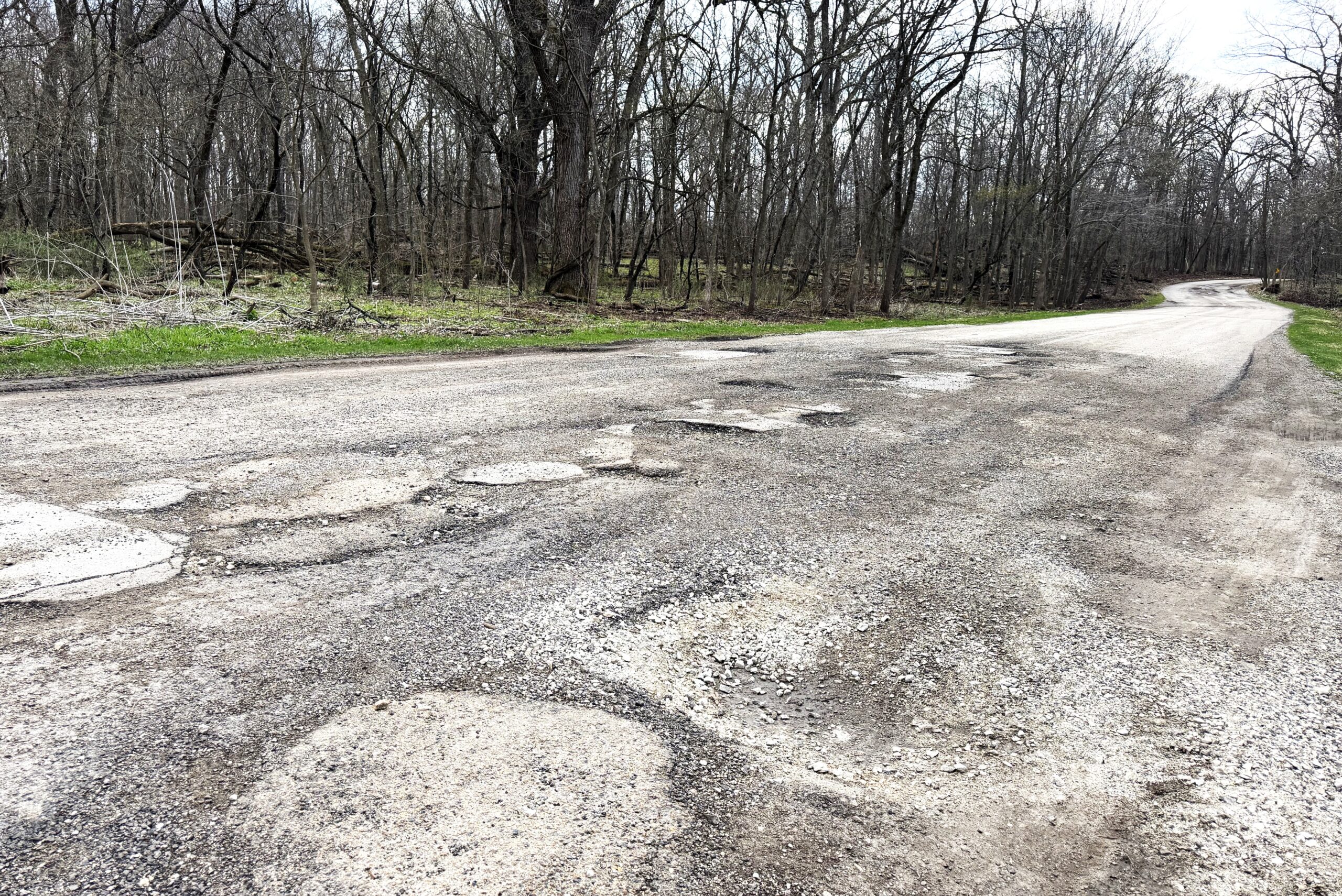 The deteriorating entrance road to Messenger Woods Nature Preserve in Homer Glen will be replaced during a three-week closure of the preserve starting May 18. (Forest Preserve photo |Meghan McMahon)