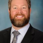 Welch Tells Benton to Resign or Face Expulsion