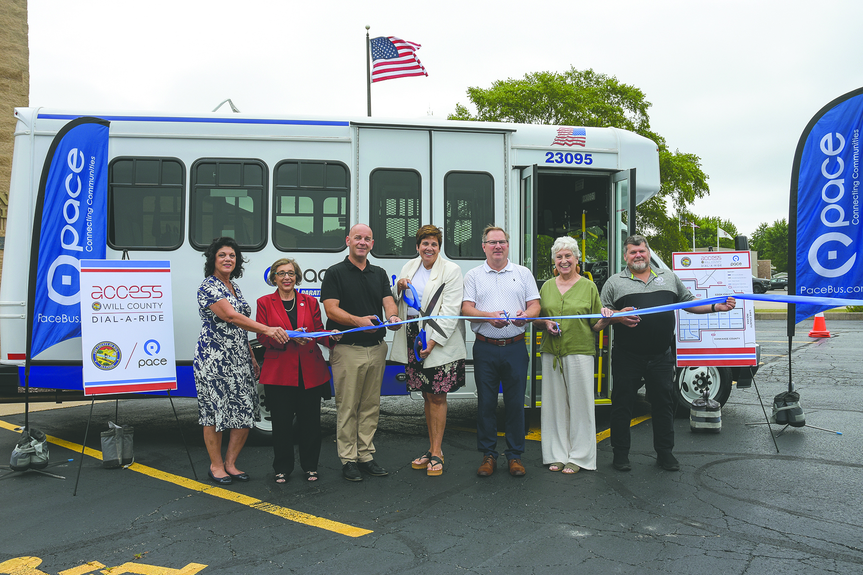 Will County Executive Jennifer Bertino-Tarrant, Pace Suburban Bus leadership, and the Mayors of Braidwood and Wilmington cut the ribbon on the expanded Access Will County Dial-a-Ride program in August, 2024. The expansion resulted from a comprehensive study of Will County’s paratransit and dial-a-ride systems, which was fully adopted by the Will County Board in December, 2024. Pictured (left to right): Wilmington City Administrator Jeannine Smith, Pace Executive Director Melinda Metzger, Wilmington Mayor Ben Dietz, County Executive Jennifer Bertino-Tarrant, Pace Chairman Rick Kwasneski, Braidwood Mayor Karen Hart, and Braidwood City Administrator Tony Altiery.