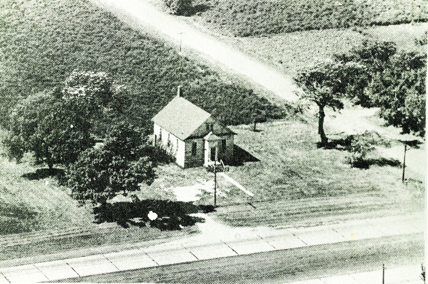 Recently, you saw a picture from 1894 of a class from the Smith District School. Here's an aerial photo, probably not from a drone, of the old school at the southwest corner of Chicago Street (Route 53) and Millsdale Road. The building burned some 10 years ago.