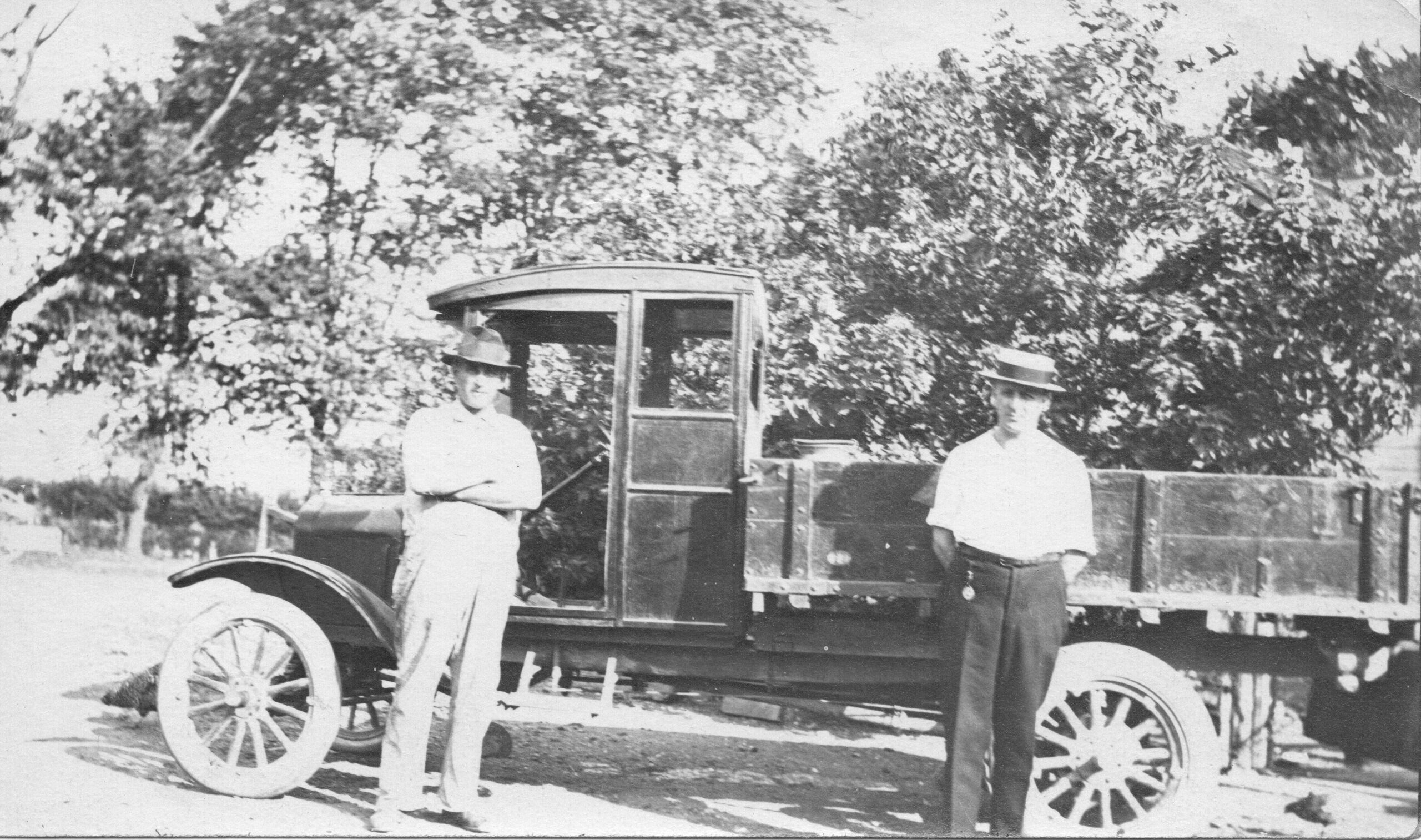 Dick Attaway shares this photo of his grandfather, Fred Attaway, on the left with an unknown associate on what he believes was his Model T one ton truck he used to collect milk from farms in the Jackson Township area. He delivered the milk to Weber's Dairy on West Jefferson Street in Joliet. He did this for many years and passed the route onto his son Paul. Dick remember as a kid going on ride-alongs with uncle Paul on the milk route in a bit newer truck. His grandfather's farm was located near the northeast corner of Route 53 (old Route 66) and Manhattan Road intersection.