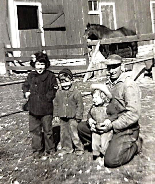 brandaukids Jeff Brandau shares this photo of Jeanette, Roy and Arlene Sangmeister on the farm sometime in the 1940s with their Daddy, Clarence.