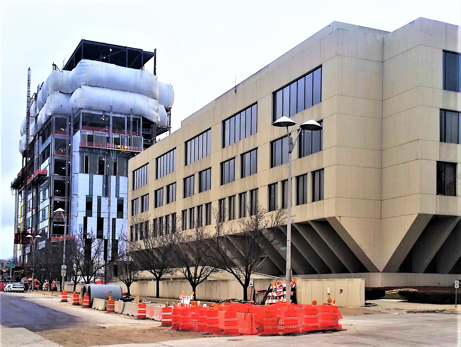 A local preservation group is clinging to hopes it can convince county officials to preserve the former courthouse, seen here in the foreground as the new courthouse was under construction in 2018.
