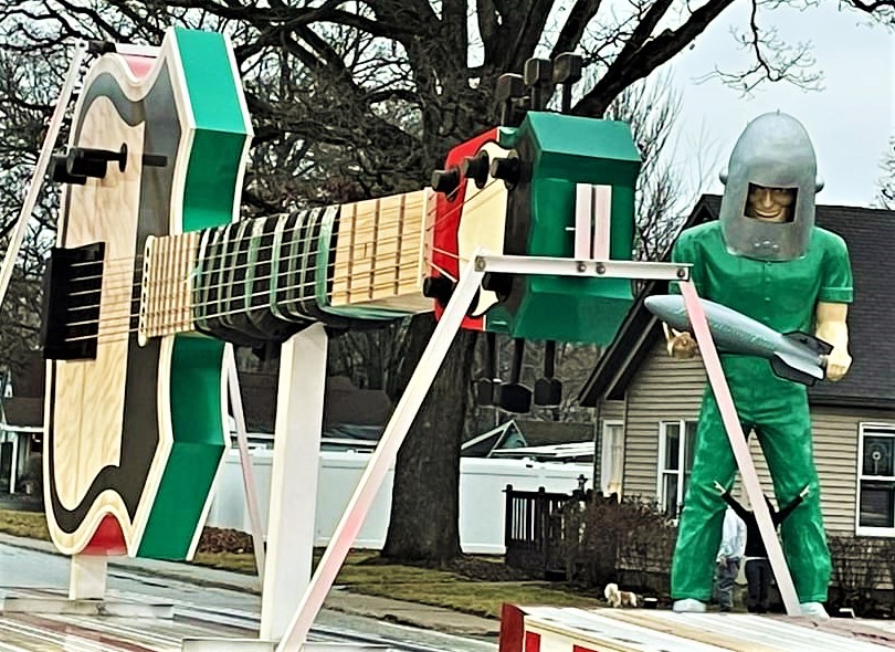The largest hand-made guitar sculpture ever created, nicknamed "Gigantar," is now part of the long history of Route 66, as it made its way to the Illinois Rock & Roll Museum on Cass Street in Downtown Joliet. Museum officials commissioned world-renowned artist Shannon (MacDonald) to create the 24-foot-tall sculpture, which was trucked from Asbury Park, N.J., to Illinois, where it was welcomed by other Route 66 stalwarts, such as the Gemini Giant at the Launching Pad in Wilmington, and the old Prison in Joliet. Rock musicians, including Rick Nielson of Cheap Trick, were scheduled to appear at a lighting ceremony on January 20. (Photos courtesy of Ron Romero/Illinois Rock & Roll Museum)