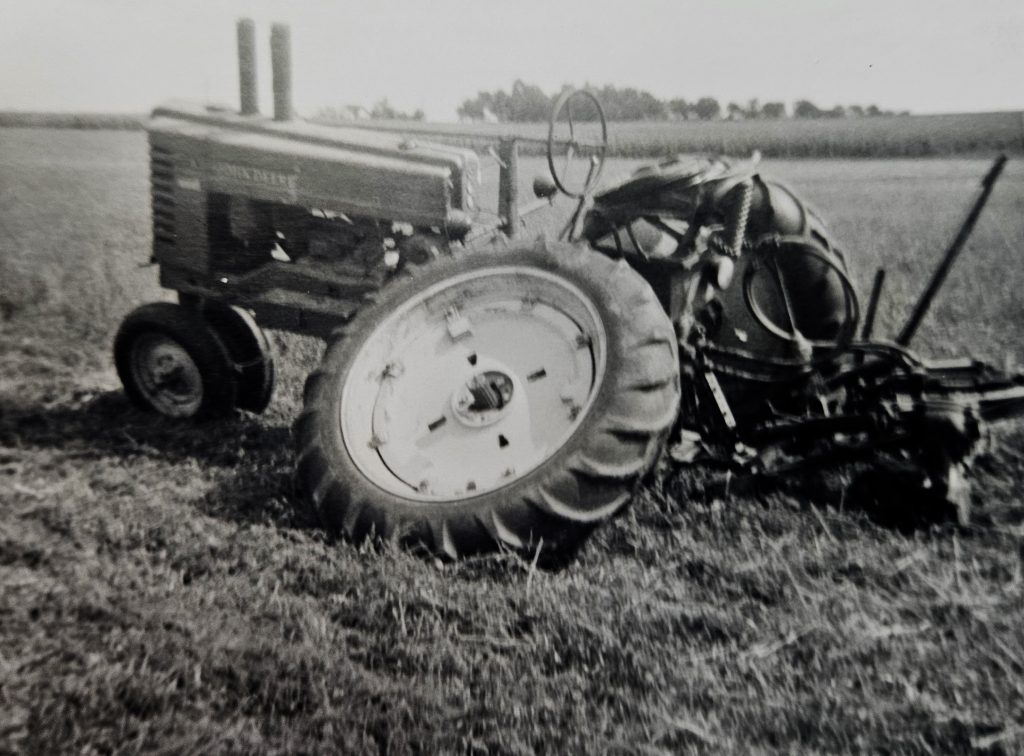 Elmer Halfeldt shares a picture showing breakdowns in the field, and having to wait hours for a John Deere rep, are nothing new. He was cutting hay on the farm in Crete Township around 1958 on a John Deere Model A when the axle broke. Know any good stories? We got time.