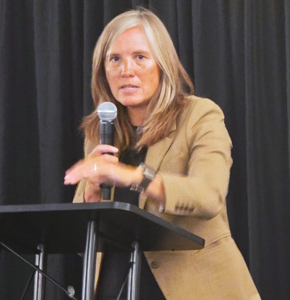Illinois Transportation Secretary Gia Biagi gives an overview of the massive amount of work being done in and around Will County during a July 15 luncheon sponsored by the Joliet Region Chamber of Commerce and Industry.