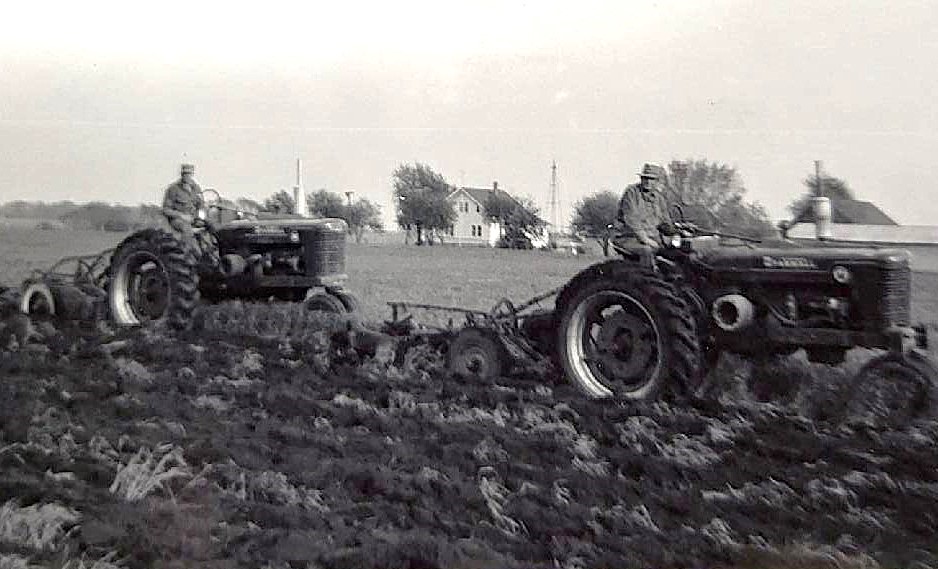 Anthony and Francis Kestel plow rye in preparation for planting corn in May 1957.