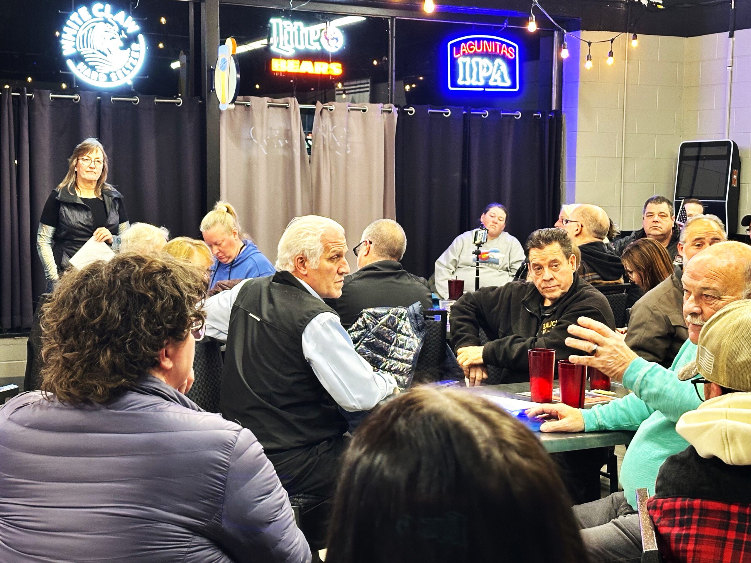 Will County Board member Judy Ogalla, R-Monee, far left, spoke to a packed room at the White Horse Inn in New Lenox January 7 to address concerns about solar farms. (Photo by Andrea Arens)