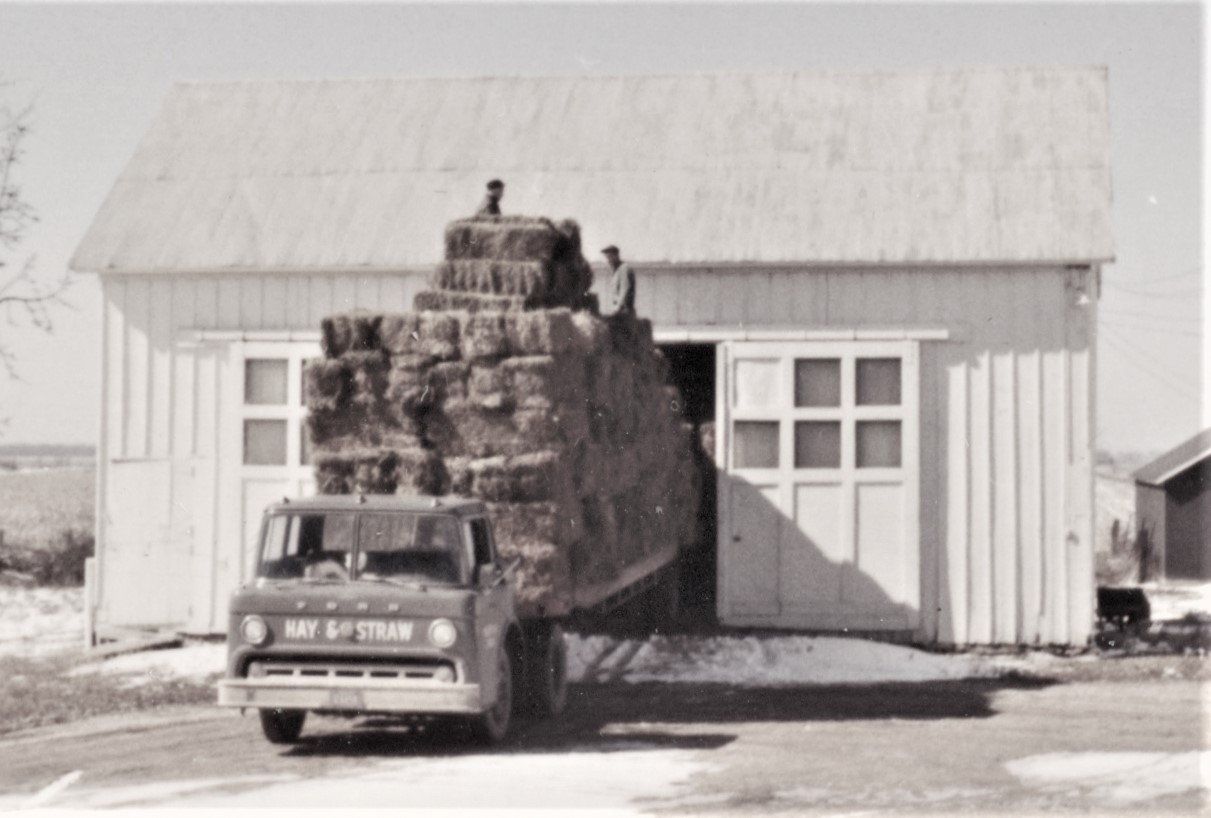 John and David Kiefner share this photo of their grandpa Conrad selling hay on the farm around March 1959. The farmhouse stood where the on-ramp for westbound I-80 from Houbolt Road now is, about 200 feet south of the current Heroes West restaurant.