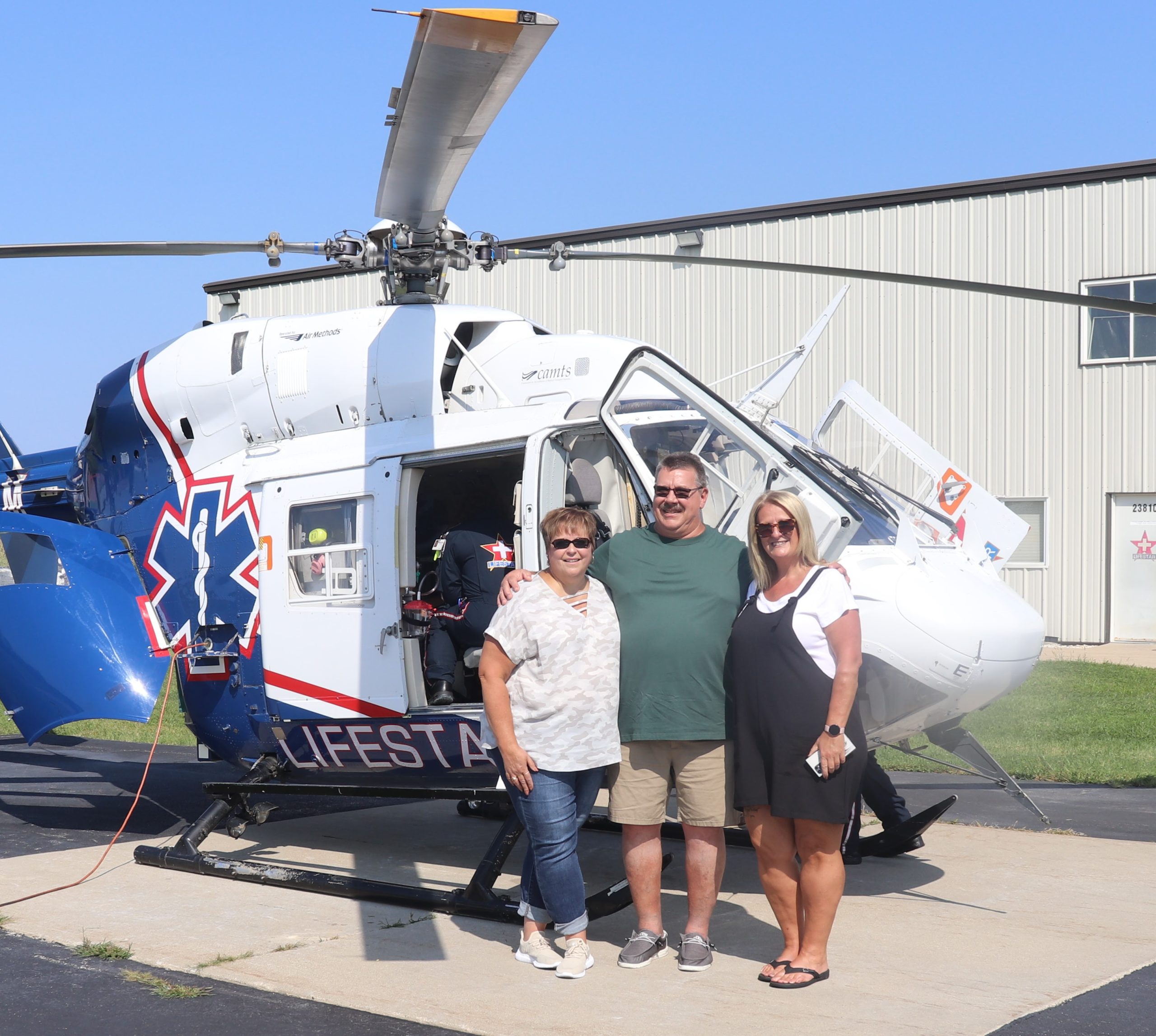 Coal City Fire Chief James Seerup, a LifeStar partner and former patient, is pictured with his family enjoying the open house festivities for LifeStar's 35th anniversary September 10 in Joliet.(Photo courtesy of Air Methods)