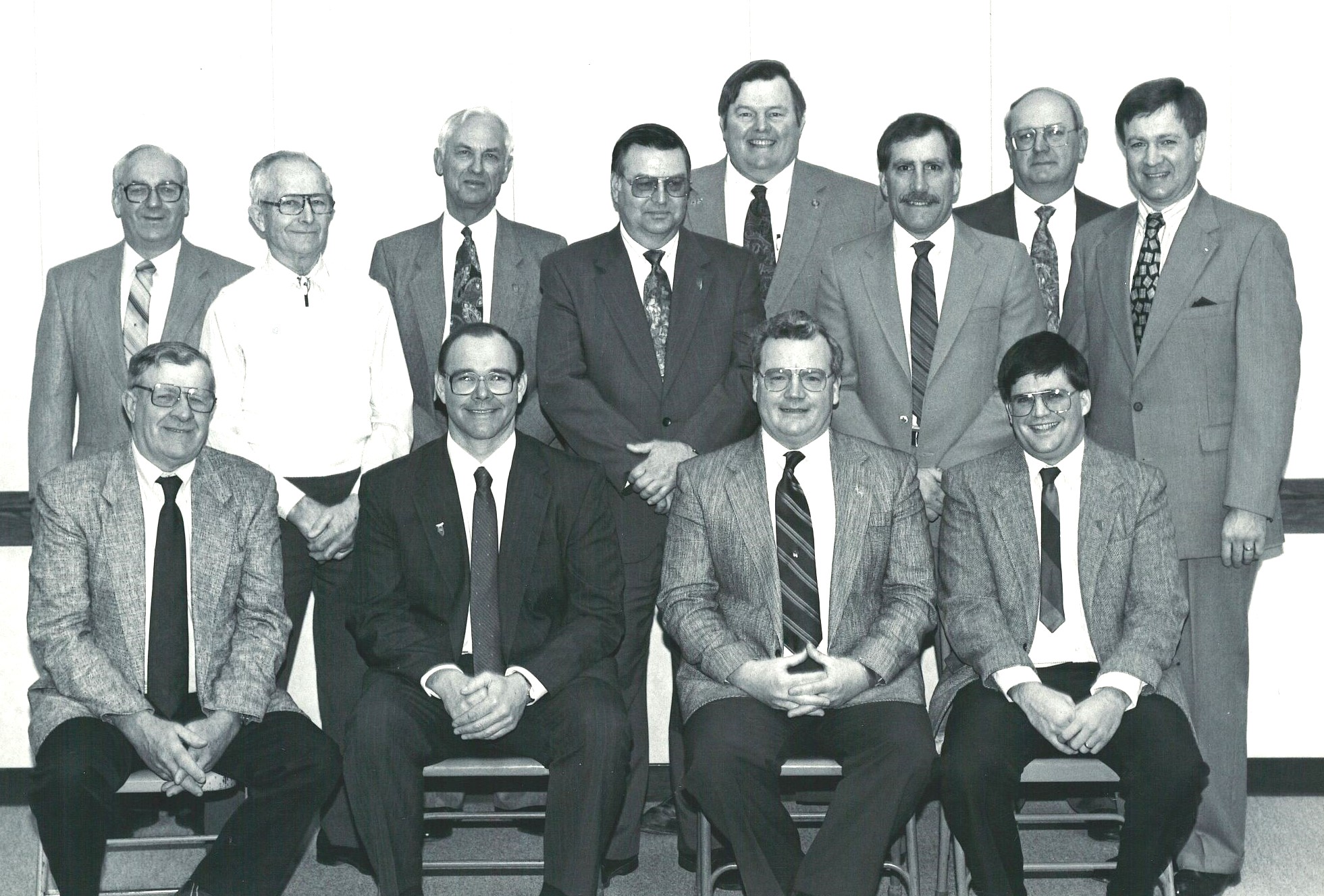 Mark Schneidewind's first board as manager of the Will County Farm Bureau in the spring of 1993: Front row, from left, Glenn Fritz, Vice President, District V; Jim Robbins, Vice President, District VIII; Lawrence Walsh, Treasurer, District 6; Mark Schneidewind, Manager. Back row, from left: William Kraph, District IX; Edgar Koehn, District XI; Robert Fitzer, District 1; John Meyer, District VIII; Jerry Davidson, District III; Glenn Ginder, District X; Jim Meader, District V; Chuck Weber, District I. Not pictured, Mike Quigley, Secretary, District IV.