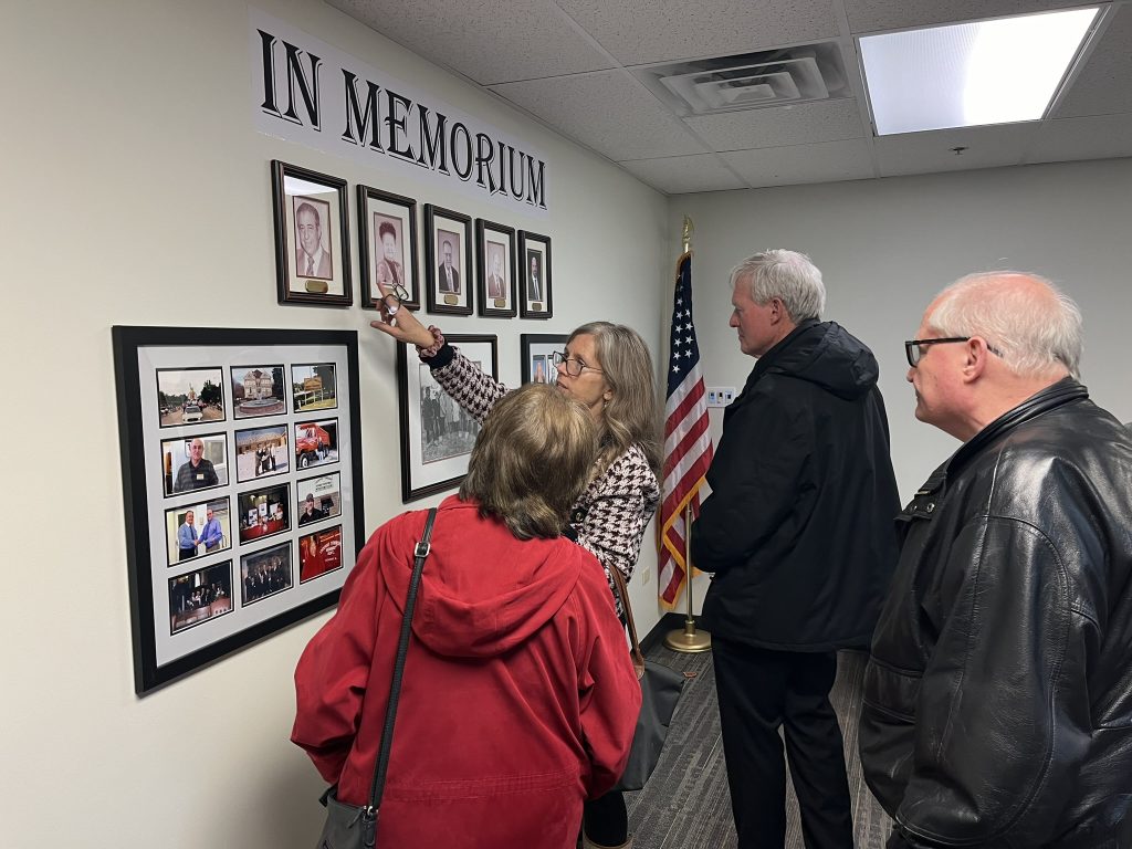 Engaged residents observing the newly unveiled memorial.