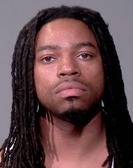 Joliet Man Faces Narcotics and Weapons Charges