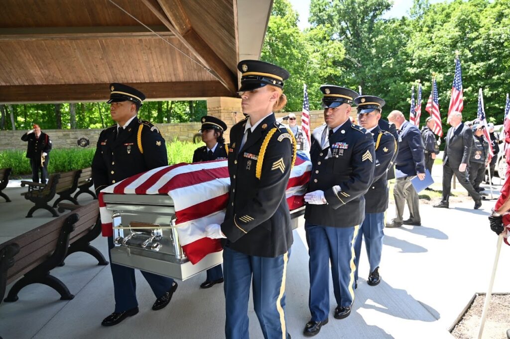 Members of the U.S. Army carry the casket for U.S. Army Air Force 2nd Lieutenant Robert L.E. Porter, who was returned home after being shot down over Germany on Feb. 4, 1944.(Photo by Stephanie Irvine)