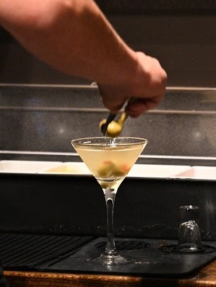 Martinis were among the adult beverages available at the official July 31 grand opening of the newest offering at Peaceful Grounds Coffee Company.(Photo by Stephanie Irvine)