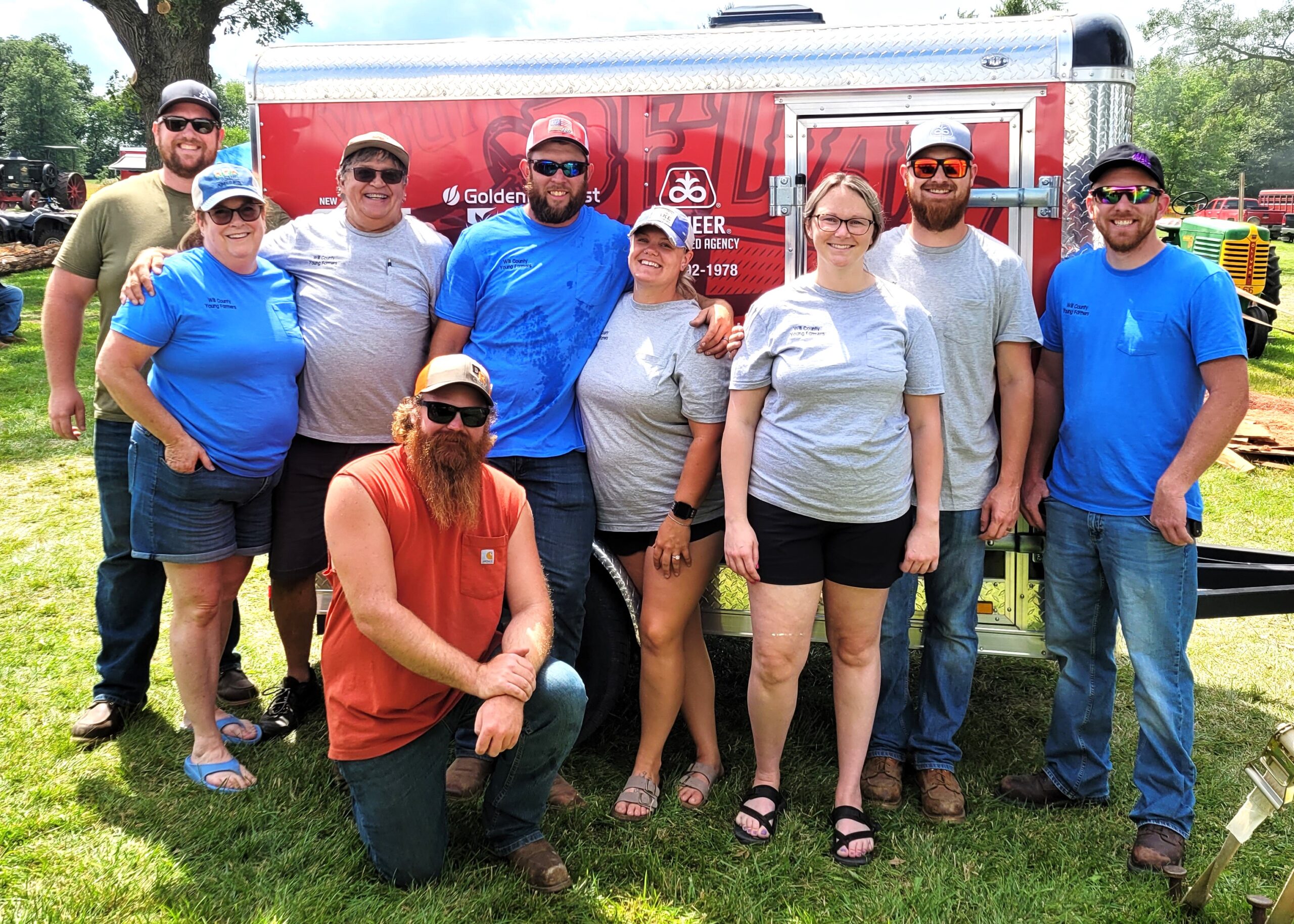 The Young Farmer crew who worked the Threshermen's Show tractor pull for the kids were, from left, Kevin Ardaugh, Anita & Mark Schneidewind, Austin Brown, Joe and Ashley Davis, Lauren and Kyle Johnston and Jarrad Mulderink.