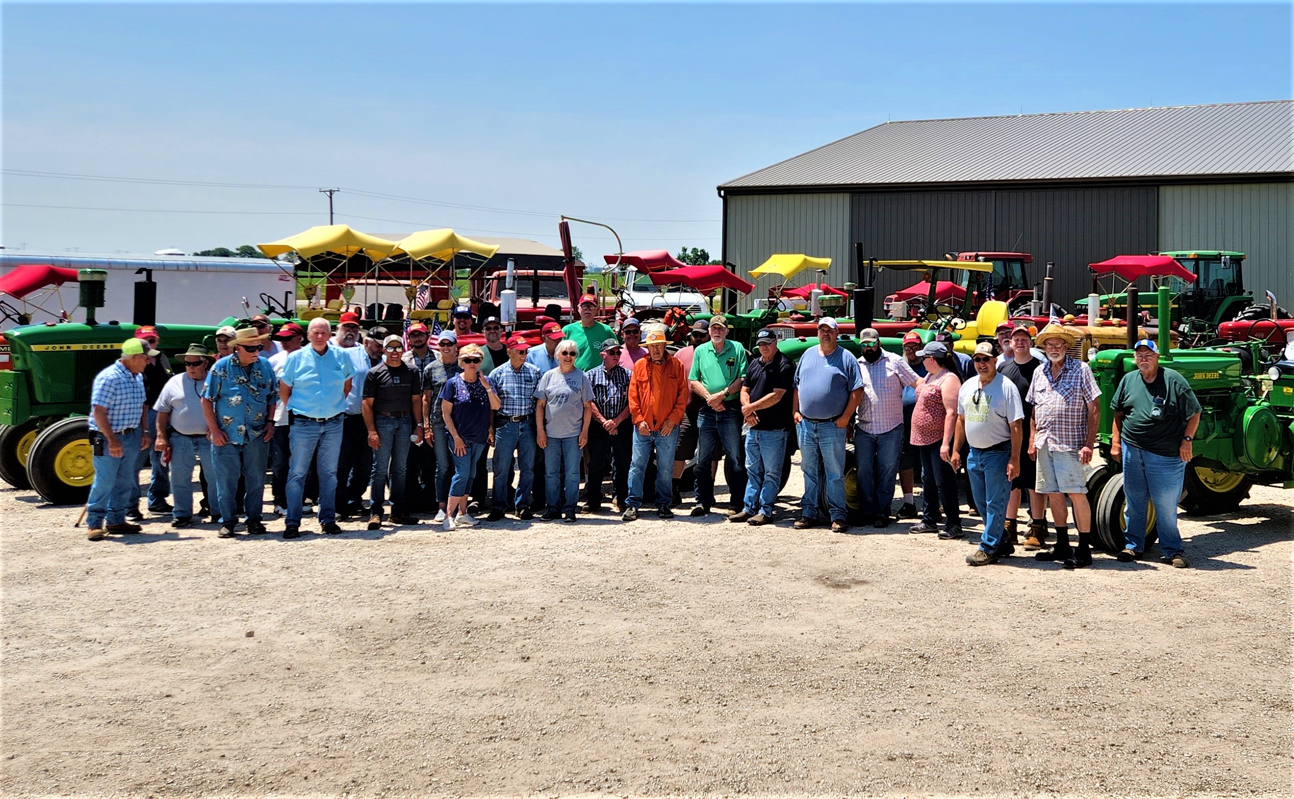 Twenty-two participants got the vintage tractors out of the shed for a 50-mile ride June 10 through Will and Grundy counties. The ride was a fundraiser for the Will County Threshermen's Association, a non-profit organization dedicated to preserving the history of agriculture and educating the public on farming practices. Above, Jim and Mark Robbins show off the Farmall 560. Right, the tractors hit the road for their day trip. Below, the gang poses for a picture at the Andy Rousonelous Farm, where they were treated to lunch. The WCTA's 61st annual show will be held July 20-23 at the Spiess Farm, east of Wilton Center. (Photos courtesy of Pam Robbins)