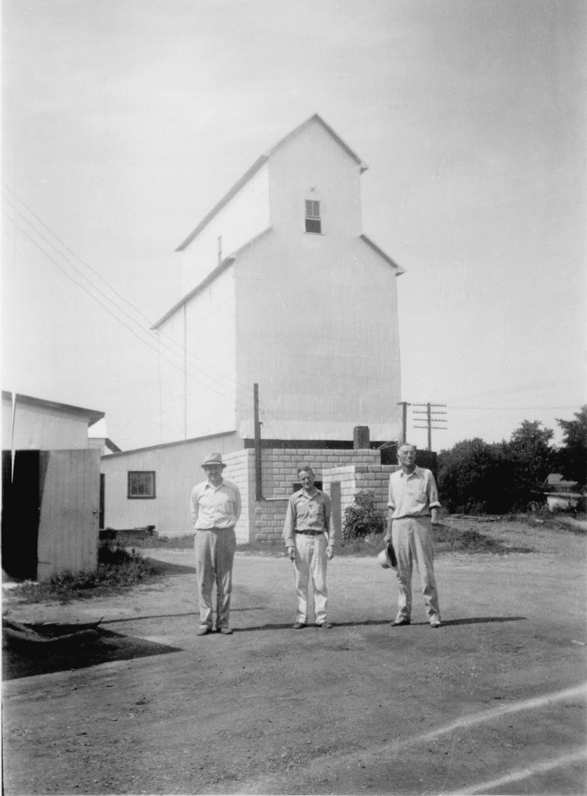 Marlene Jones shares this photo of John H. Jones, Senior Partner (right), Raymond Baskerville, Minority Partner (left), Jimmy Hooper, Bookkeeper (center) of Symerton Grain and Lumber Co. (circa 1935). John H. Jones was the father of J. Merle Jones. a prominent truck dealer in the Joliet area. John H. Jones also has three grandsons living and in business in Joliet -- John M. Jones, Jr., Donald L. Jones, and Dennis E. Jones. John's wife is Marlene Schwiesow Jones, born and raised in Green Garden Township. Thanks, Marlene!