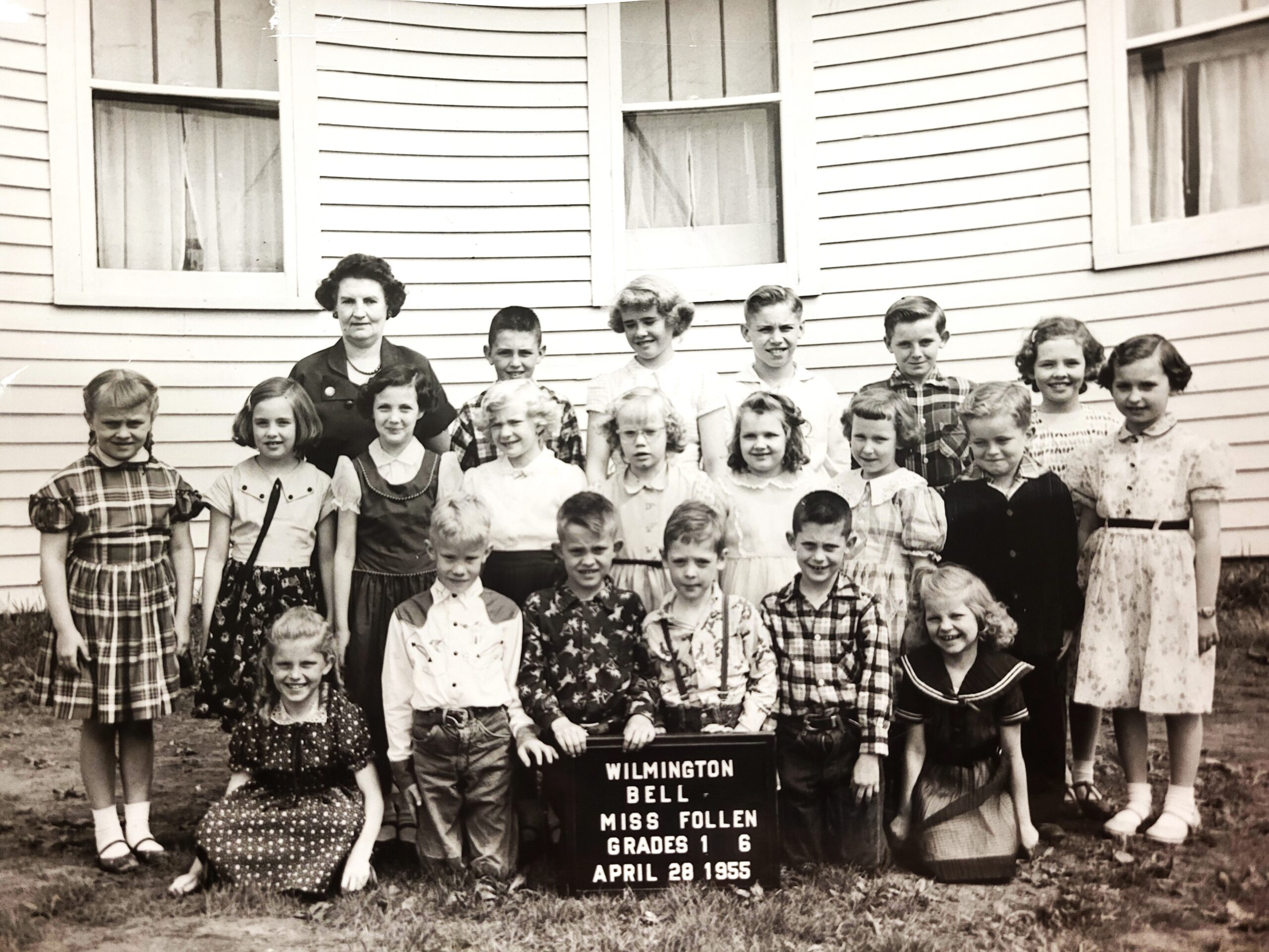 Margaret Kennedy Benoit shares this photo of all the bright, shiny faces at Bell School in Wilmington, where she and her brother, Robert Kennedy, attended for two years before the school closed. Robert is the young man in suspenders in the front row holding the sign, and Margaret is the one far back on the right with the curls and a big smile hundreds of her students would get to enjoy when she taught years later.