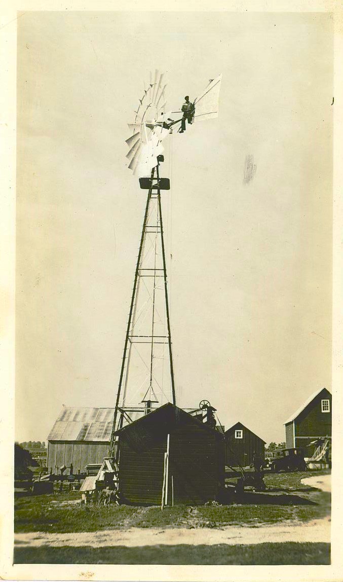 Wind power is nothing new on farms, as this farmhand on the Seggebruch farm Crete shows us the 16-foot diameter mill. We hope all that work wasn't in vane!