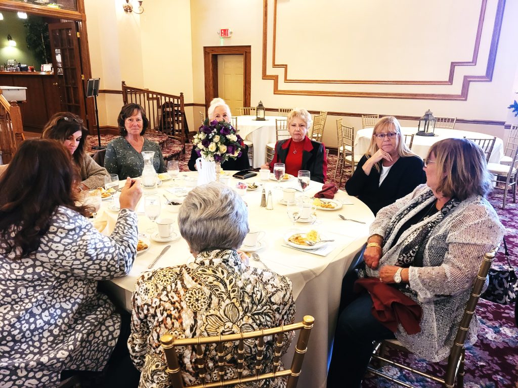 These ladies pose for a quick picture as they enjoy the food and entertainment during the Women for Family Farms fall luncheon held at the Victorian Ballroom in Joliet, following the committee meeting.