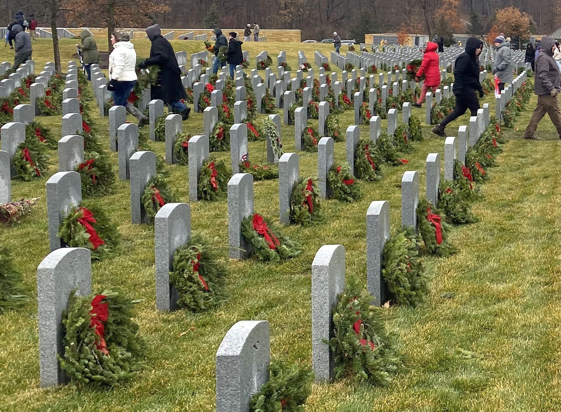 Volunteers braved a cold, soggy morning to help make sure the 36,000 wreaths donated this year for Wreaths Across America were placed properly at Abraham Lincoln National Cemetery in Elwood.(Phots by Stephanie Irvine)