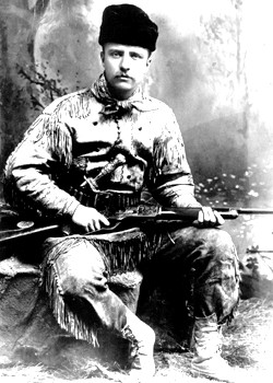 A very young Teddy Roosevelt all decked out for hunting